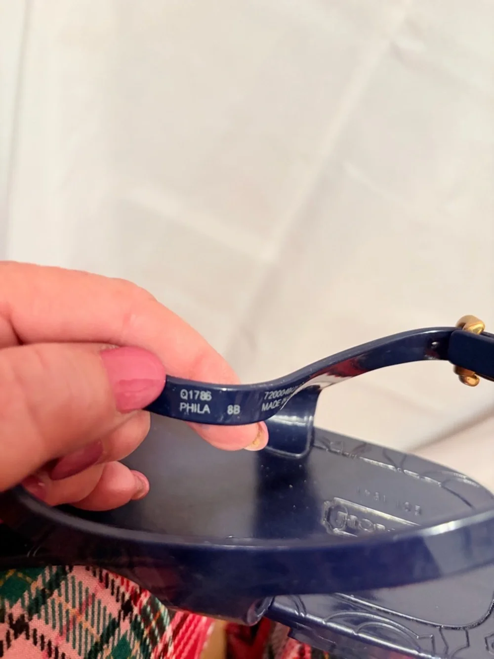 Coach Phila jelly thong sandals in navy blue/gold turnlock and O-ring details